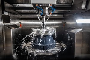 Metalworking CNC lathe milling machine. Cutting metal modern processing technology. Milling is the process of machining using rotary cutters to remove material by advancing a cutter into a workpiece.
